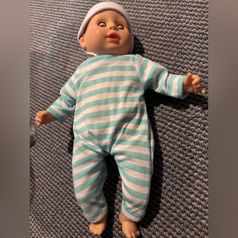 Melissa and Doug baby doll. Approximately 16 inches. Open and close eyes.